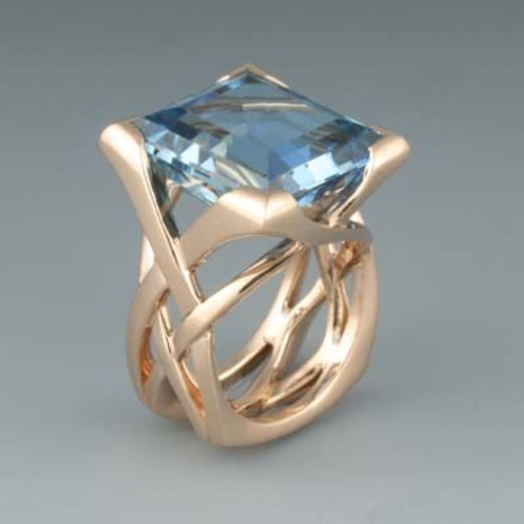 Bague en zircon bleu vintage en or rose